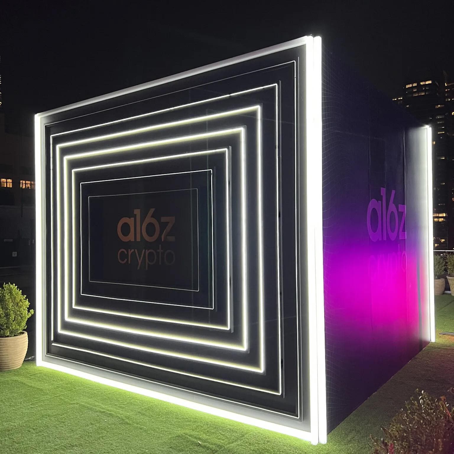 The a16z crypto 360° mirror room, glowing on a Tribeca rooftop.