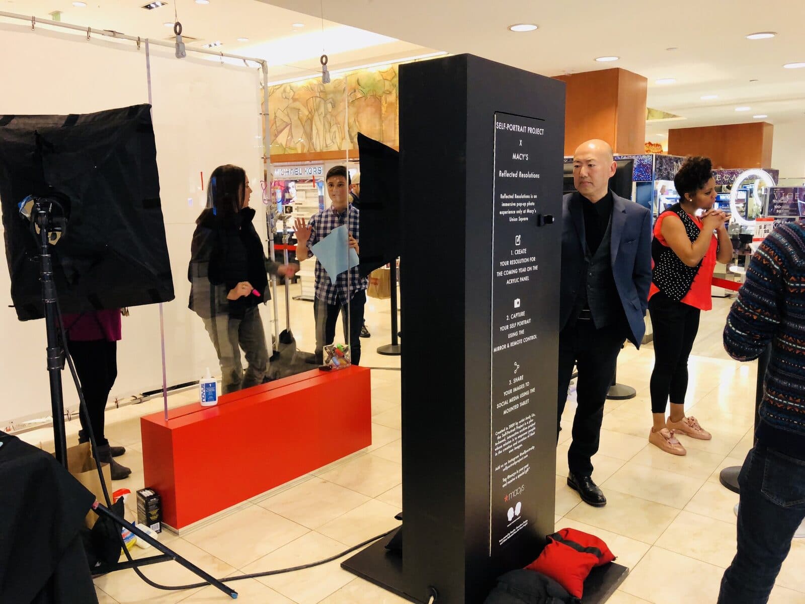 The Self-Portrait Project monolith mid-activation on the floor at Macy’s.