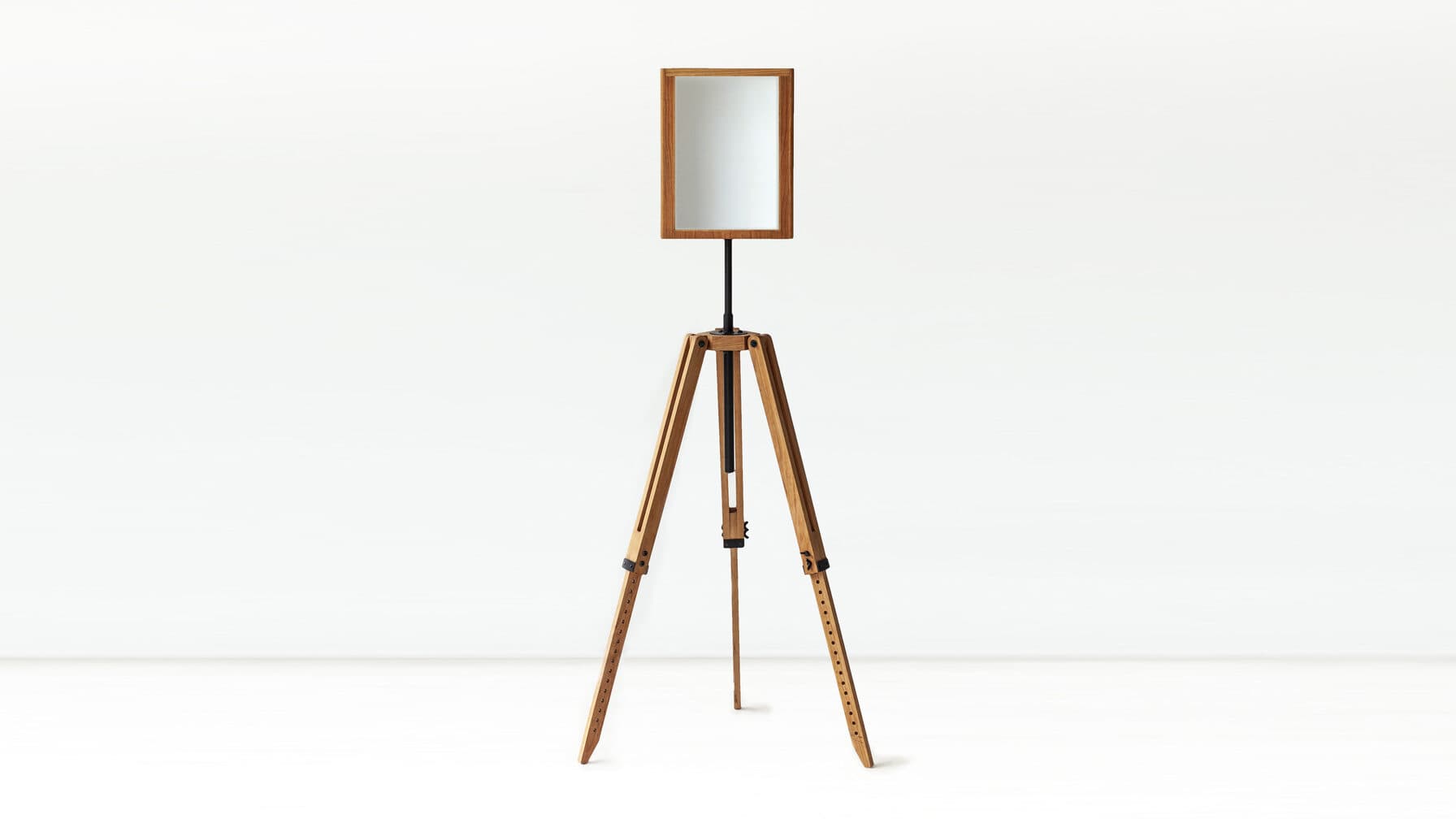 The Self-Portrait unit from the front — the two-way mirror on its wooden stand